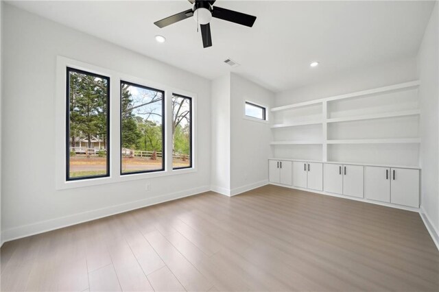 155 Westbrook St, Buford, GA 30518 - empty room featuring wood finished floors, ceiling fan, baseboards, and recessed lighting
