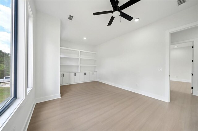 155 Westbrook St, Buford, GA 30518 - empty room with visible vents, baseboards, a ceiling fan, and wood finished floors