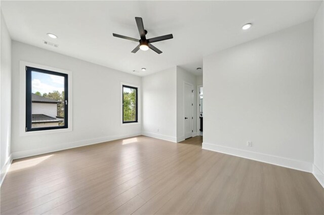 155 Westbrook St, Buford, GA 30518 - empty room featuring wood finished floors, ceiling fan, baseboards, and visible vents