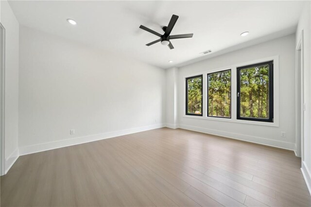 155 Westbrook St, Buford, GA 30518 - unfurnished room featuring visible vents, ceiling fan, baseboards, and wood finished floors