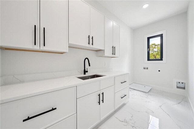 155 Westbrook St, Buford, GA 30518 - kitchen featuring light stone countertops, white cabinets, recessed lighting, marble finish floor, and a sink