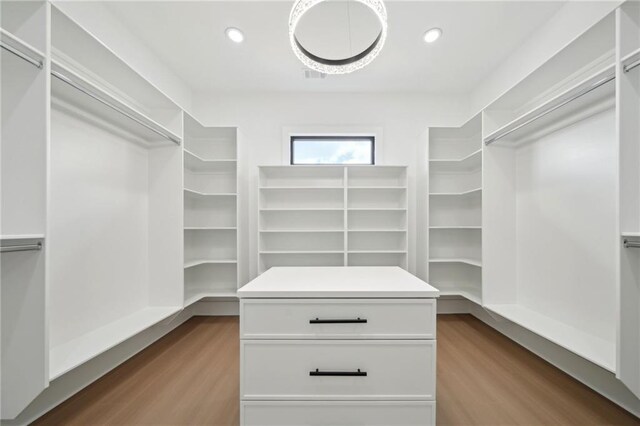 155 Westbrook St, Buford, GA 30518 - walk in closet with visible vents and wood finished floors