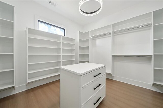 155 Westbrook St, Buford, GA 30518 - walk in closet featuring dark wood-style flooring and visible vents