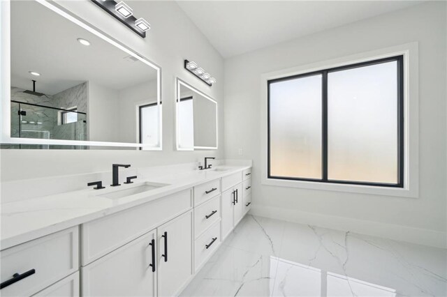155 Westbrook St, Buford, GA 30518 - bathroom with baseboards, double vanity, a marble finish shower, marble finish floor, and a sink