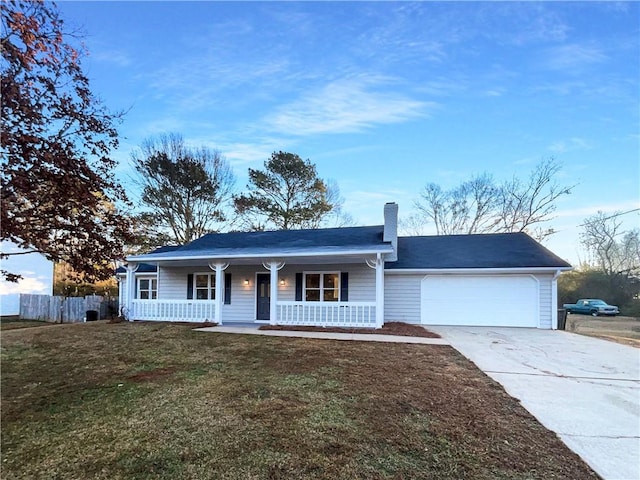 single story home featuring a garage, a front lawn, and covered porch