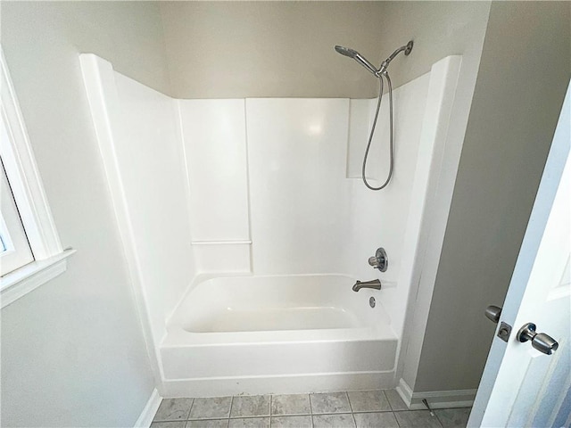 bathroom featuring shower / tub combination and tile patterned flooring