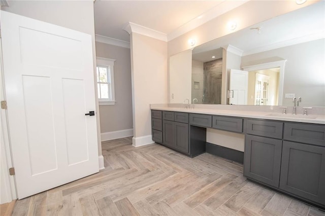 bathroom with vanity, a shower, parquet floors, and crown molding