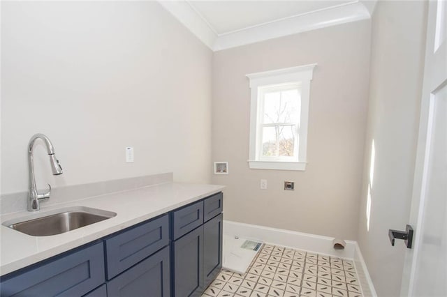 washroom with cabinets, hookup for a washing machine, ornamental molding, electric dryer hookup, and sink