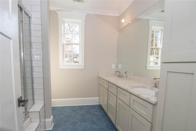 bathroom featuring tile patterned floors, vanity, ornamental molding, and walk in shower