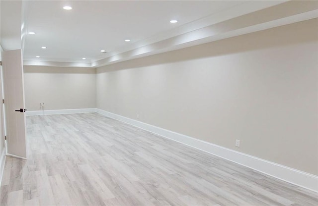 basement featuring light hardwood / wood-style floors