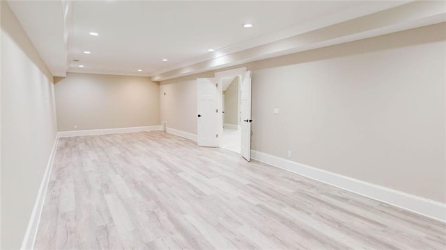 basement featuring light hardwood / wood-style floors