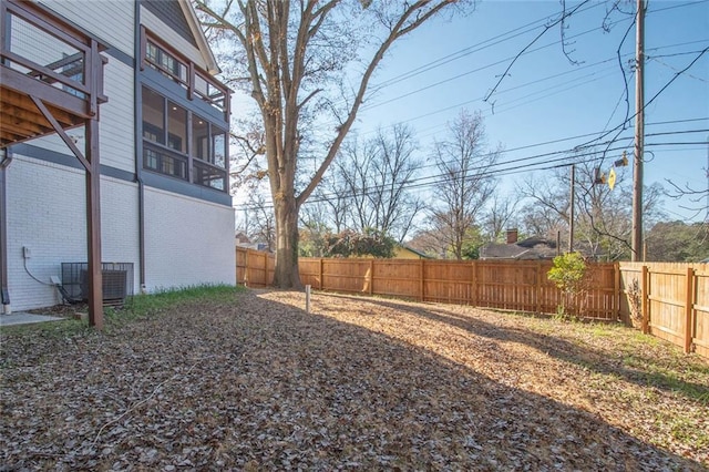 view of yard featuring central AC