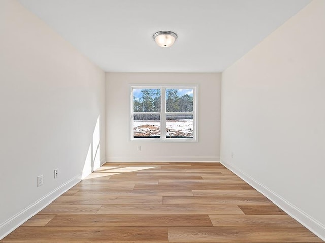 empty room featuring light hardwood / wood-style floors