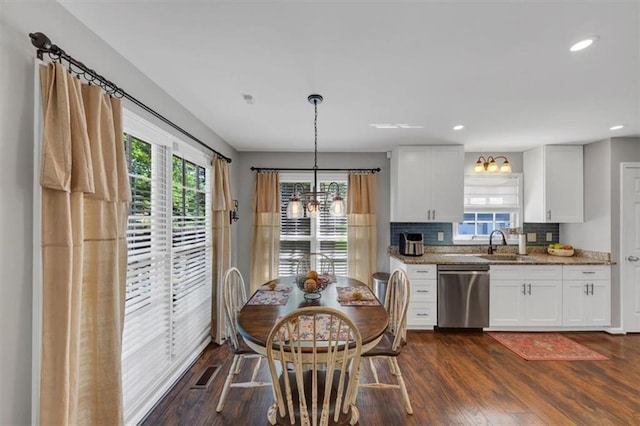 70 Maplewood Ln, Acworth, GA 30101 - kitchen featuring dishwasher, a chandelier, light stone counters, dark wood-style flooring, and recessed lighting