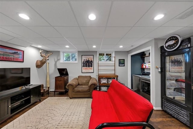 70 Maplewood Ln, Acworth, GA 30101 - living room with washing machine and dryer, dark wood-type flooring, a drop ceiling, and recessed lighting