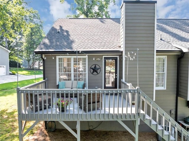 70 Maplewood Ln, Acworth, GA 30101 - back of property featuring a shingled roof, a chimney, and a wooden deck