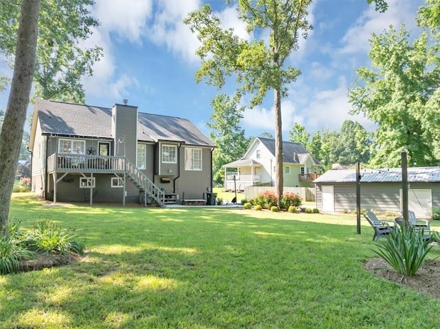 70 Maplewood Ln, Acworth, GA 30101 - rear view of house featuring stairway, a chimney, a wooden deck, a lawn, and a residential view