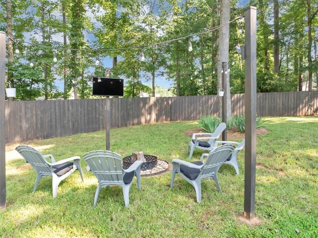 70 Maplewood Ln, Acworth, GA 30101 - fenced backyard featuring a fire pit