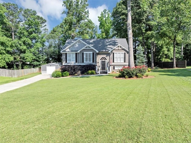 70 Maplewood Ln, Acworth, GA 30101 - raised ranch with an outbuilding, driveway, a detached garage, and stone siding
