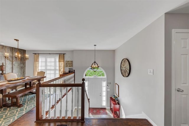 70 Maplewood Ln, Acworth, GA 30101 - foyer entrance featuring a chandelier and wood finished floors
