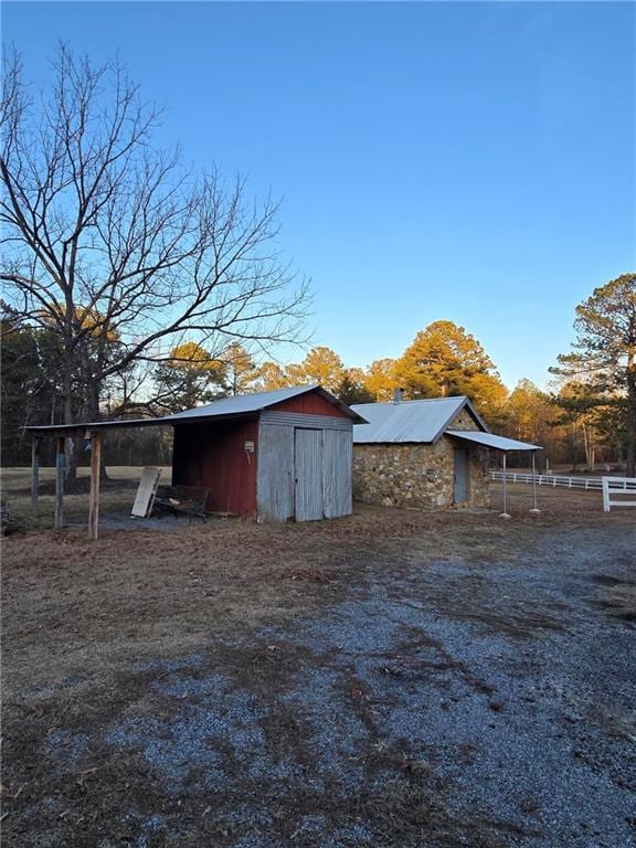 view of outbuilding featuring a rural view