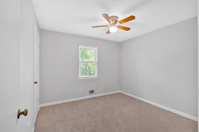 19 Quail Hollow Ct, Dallas, GA 30157 - spare room featuring a ceiling fan, light colored carpet, baseboards, and a textured ceiling