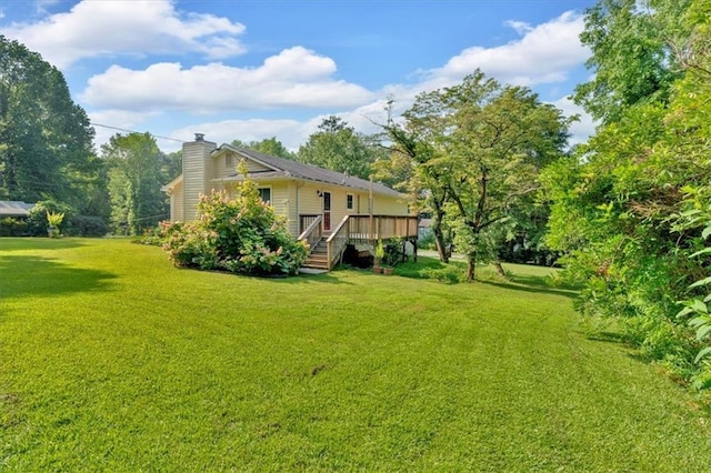 19 Quail Hollow Ct, Dallas, GA 30157 - view of grassy yard with a wooden deck and stairway