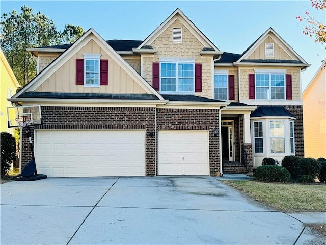 craftsman inspired home with a garage