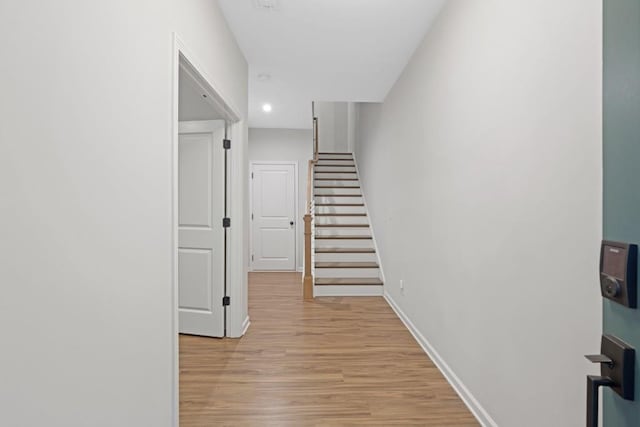 hallway featuring light hardwood / wood-style flooring