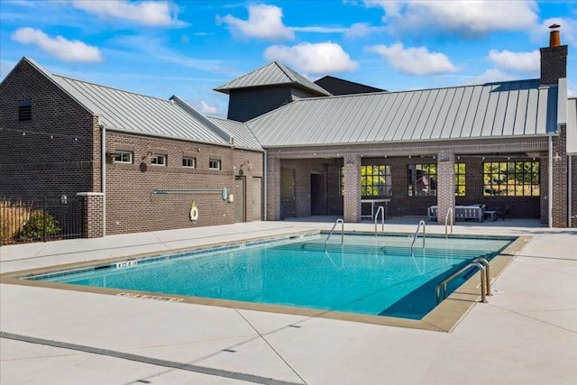 view of pool with a patio area