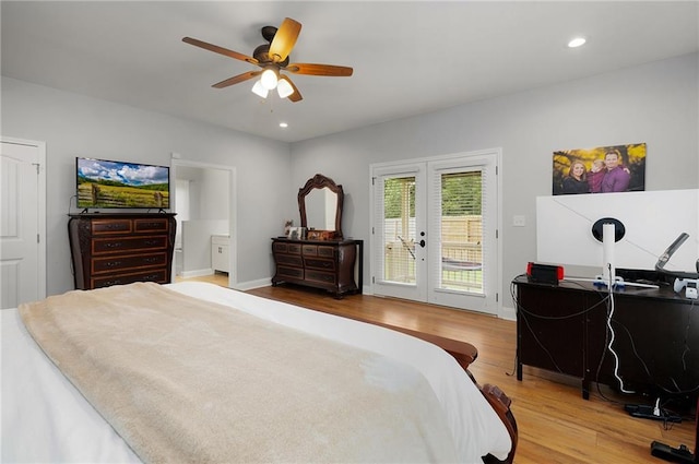 bedroom featuring access to exterior, french doors, recessed lighting, wood finished floors, and baseboards