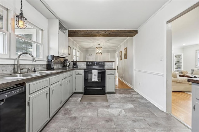 kitchen featuring sink, gray cabinetry, decorative light fixtures, beamed ceiling, and black appliances