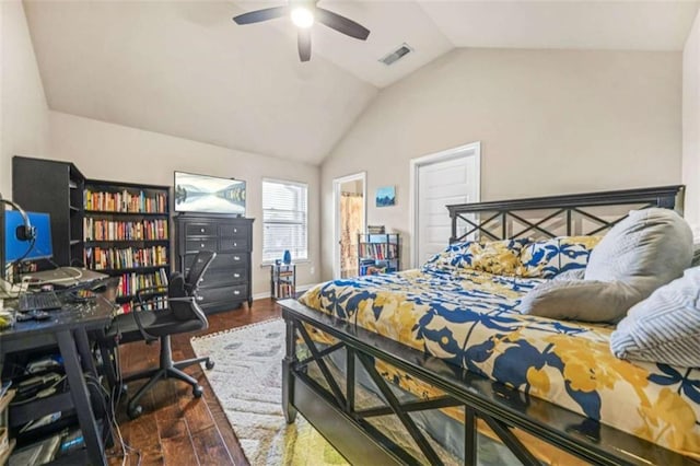 bedroom featuring dark hardwood / wood-style flooring and vaulted ceiling