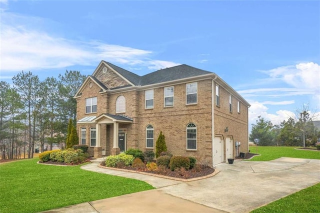 view of front facade featuring a garage and a front yard