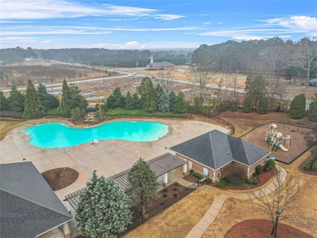 view of swimming pool with a patio