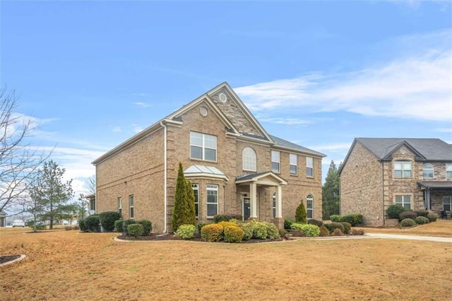 view of front facade with a front yard