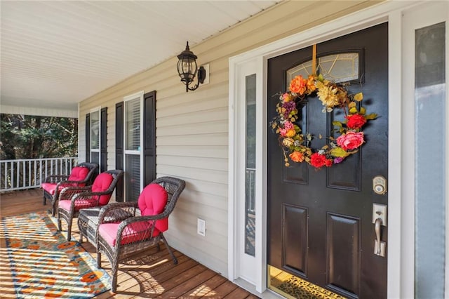 entrance to property with covered porch