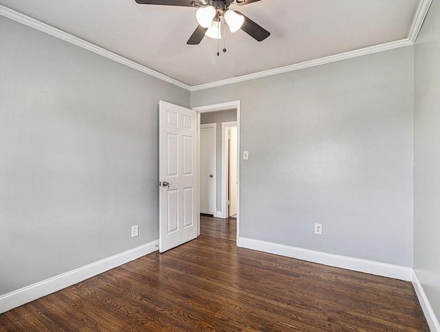 3453 Eisenhower Cir E, Atlanta, GA 30354 - spare room featuring baseboards, ceiling fan, crown molding, and dark wood-style floors