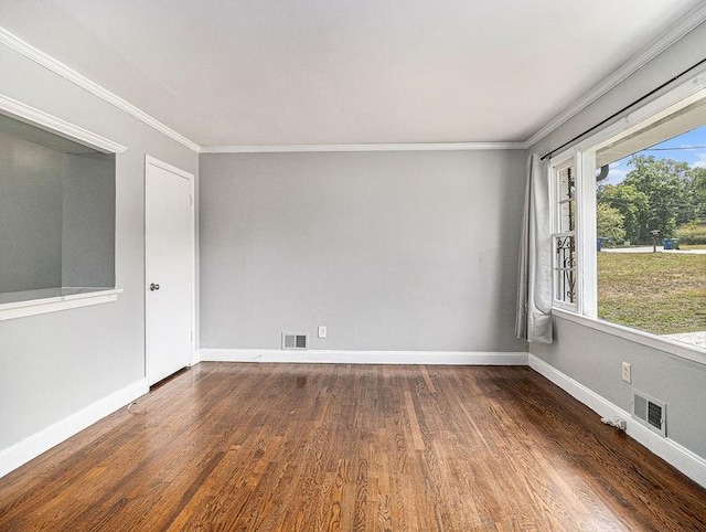 3453 Eisenhower Cir E, Atlanta, GA 30354 - unfurnished room featuring wood finished floors, crown molding, and baseboards