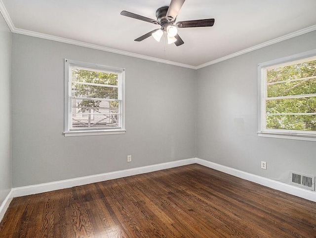3453 Eisenhower Cir E, Atlanta, GA 30354 - spare room with dark wood finished floors, baseboards, ornamental molding, and ceiling fan