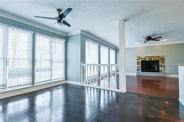 unfurnished living room with baseboards, ceiling fan, wood finished floors, and ornamental molding