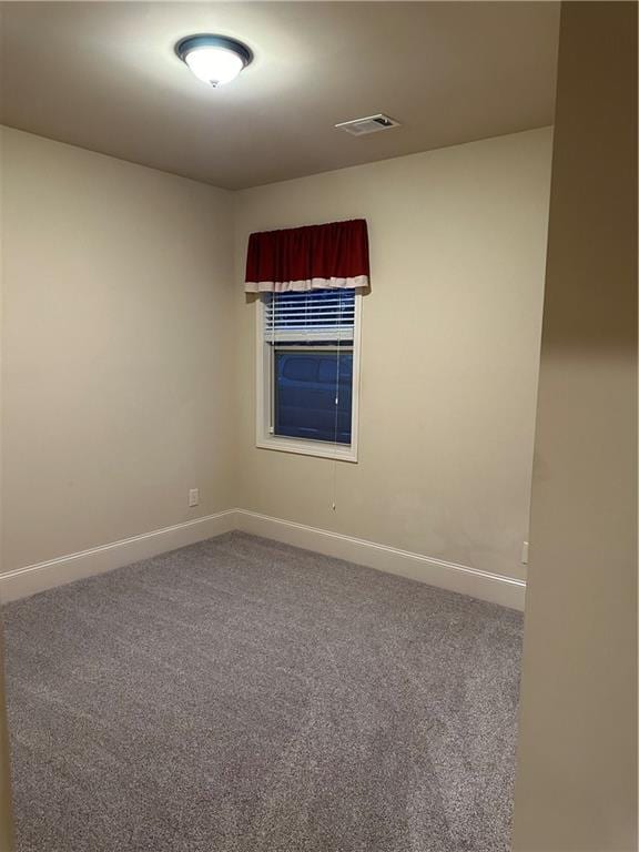 empty room with carpet floors