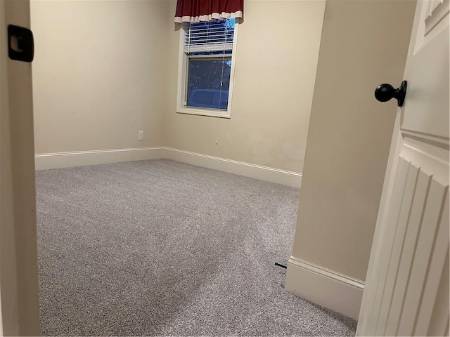 unfurnished room featuring carpet floors