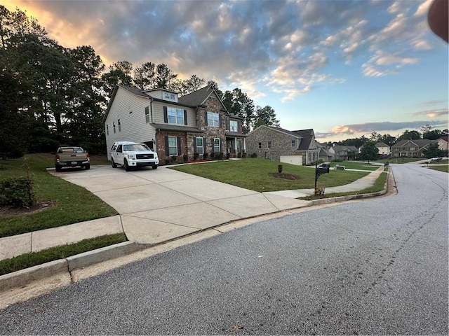 view of front of house with a yard