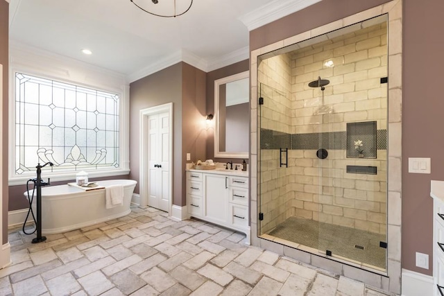 bathroom featuring crown molding, vanity, and independent shower and bath