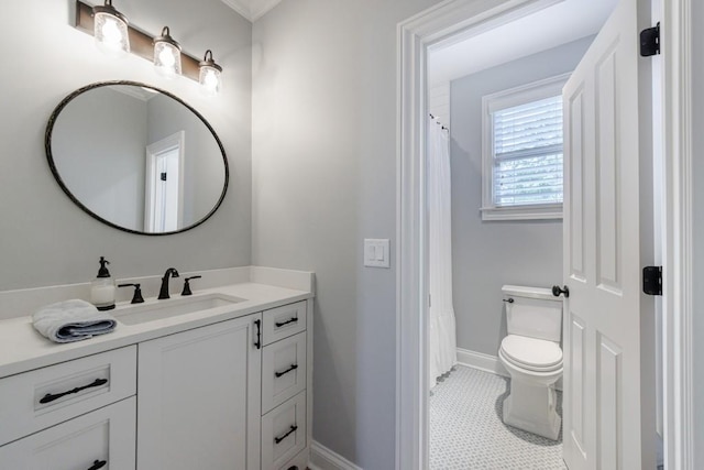 bathroom featuring tile patterned floors, vanity, walk in shower, and toilet