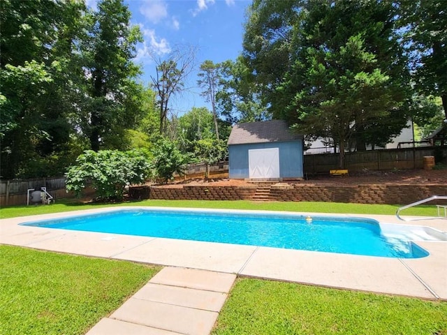 2913 Jordan Forest Trl, Lawrenceville, GA 30044 - view of swimming pool with a storage shed and a fenced backyard