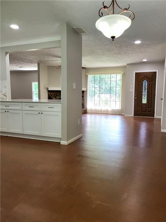 2913 Jordan Forest Trl, Lawrenceville, GA 30044 - entryway with plenty of natural light, recessed lighting, and dark wood-style floors