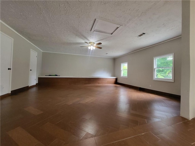 2913 Jordan Forest Trl, Lawrenceville, GA 30044 - spare room with ornamental molding and a textured ceiling