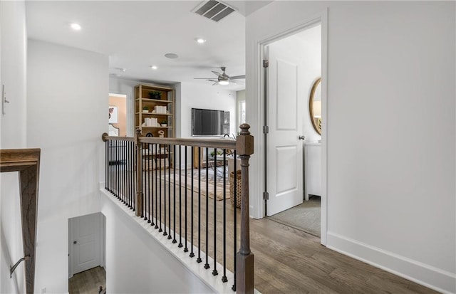 317 Foxglove Way, Mcdonough, GA 30253 - hall with an upstairs landing, wood finished floors, baseboards, and recessed lighting